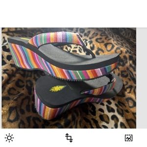 Volatile wedge flip flops